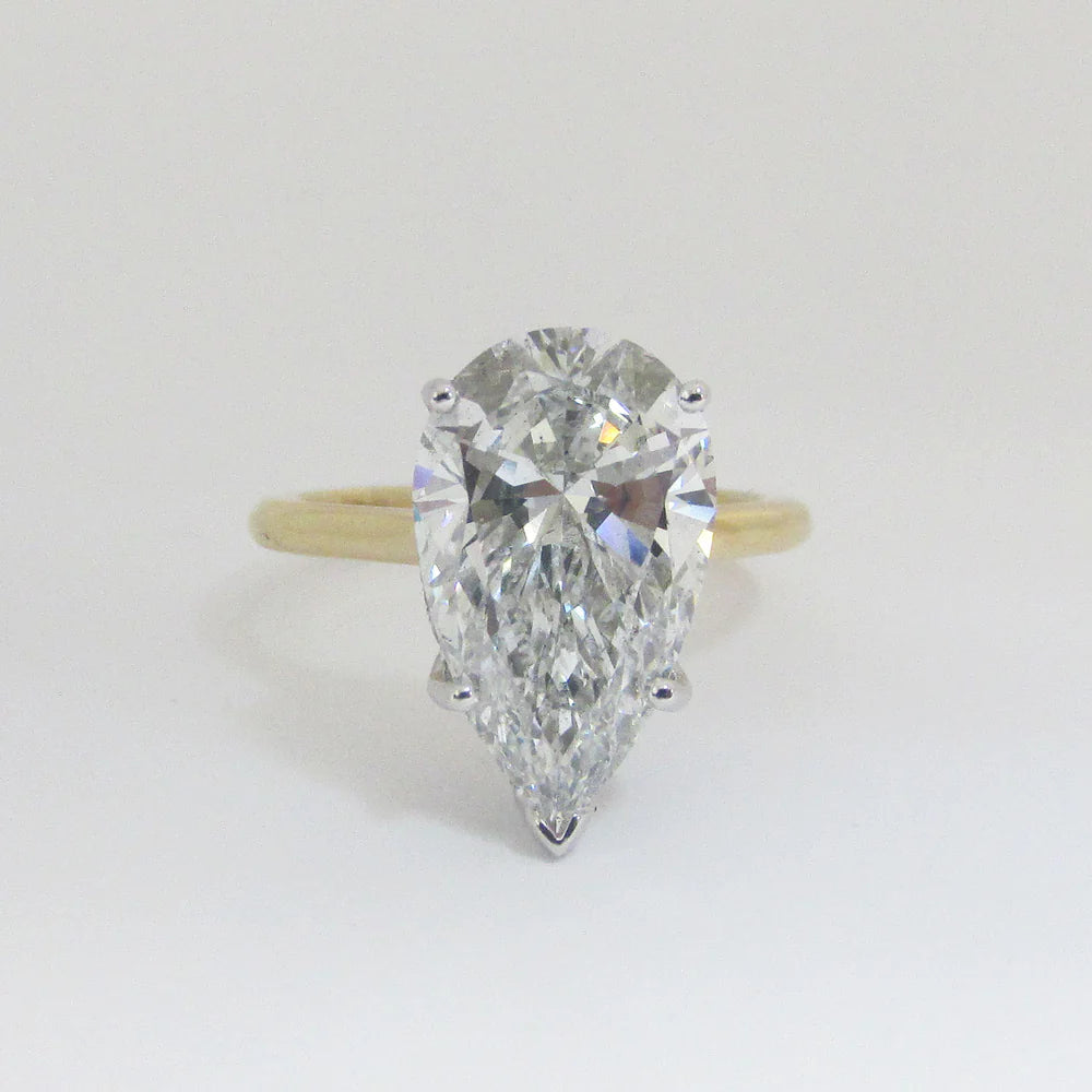 Diamond ring with pear-shaped stone
