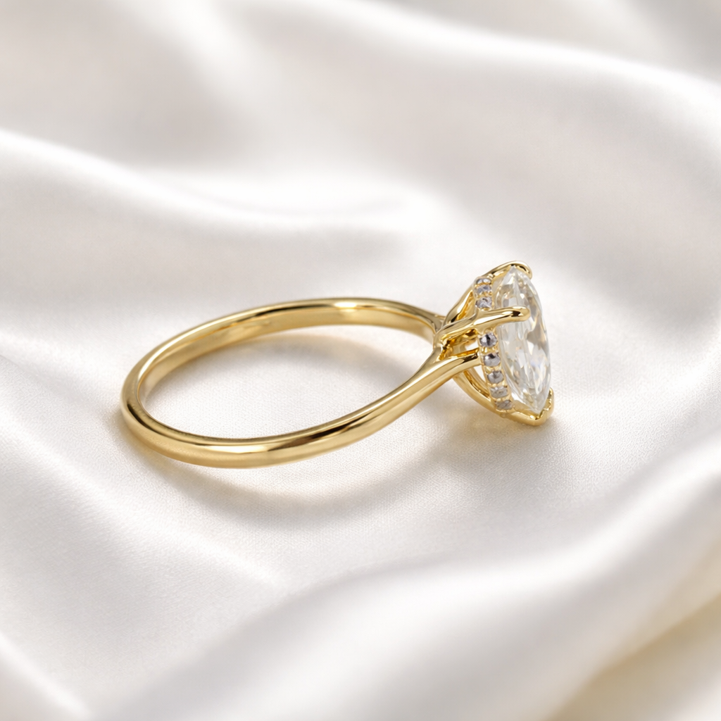 1.39 carat pear shaped diamond with hidden halo setting in yellow gold