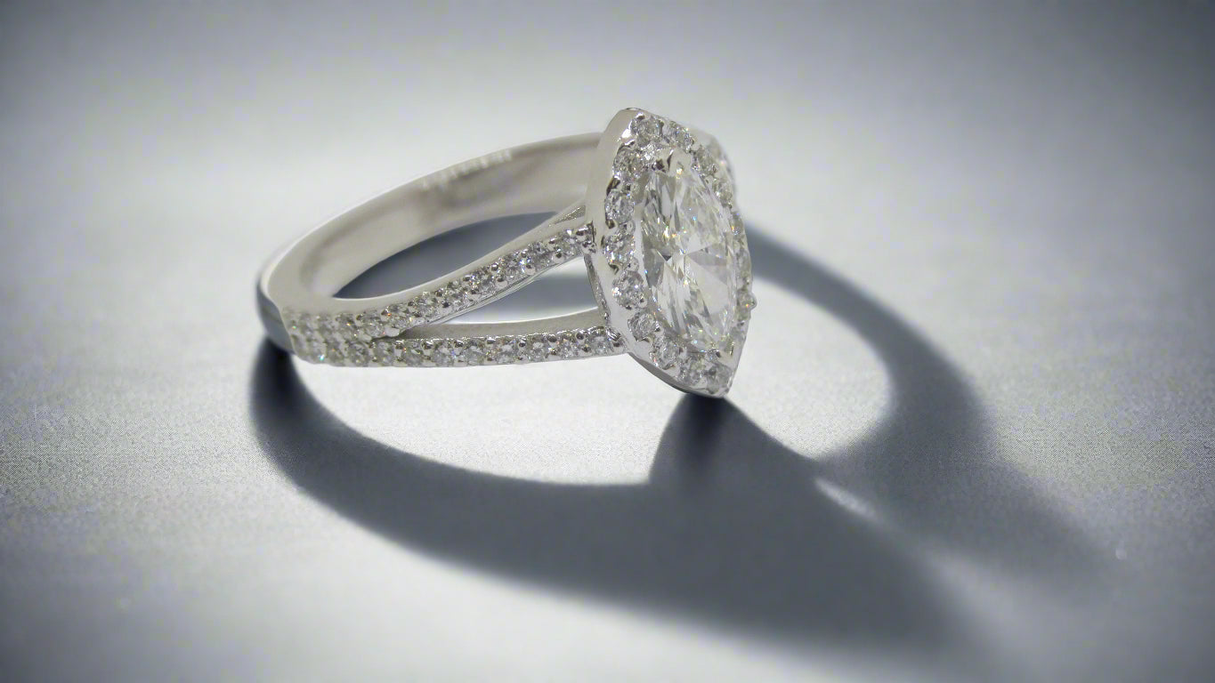 Marquise Diamond Engagement Ring with Split Band Halo Design