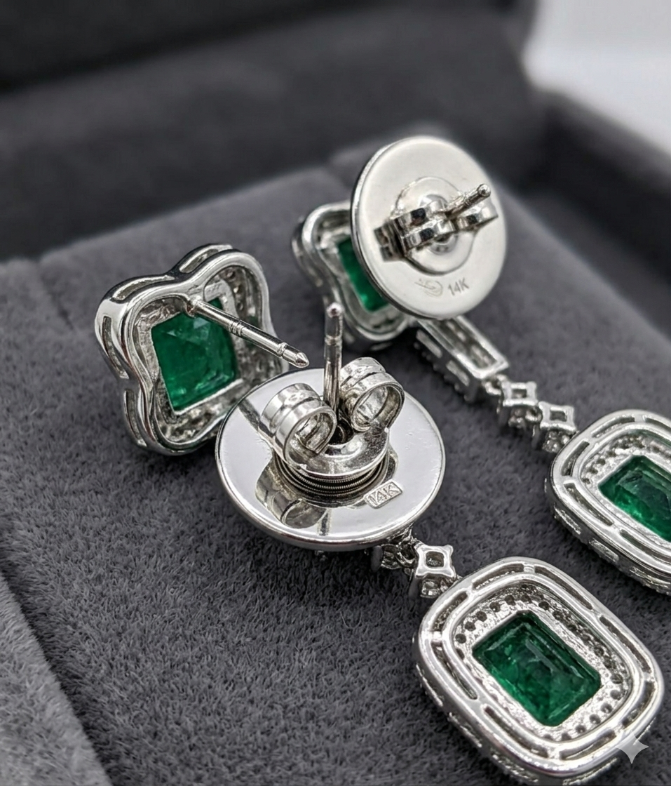 14K white gold lab emerald and diamond drop earrings with square and octagon emeralds surrounded by diamond halos