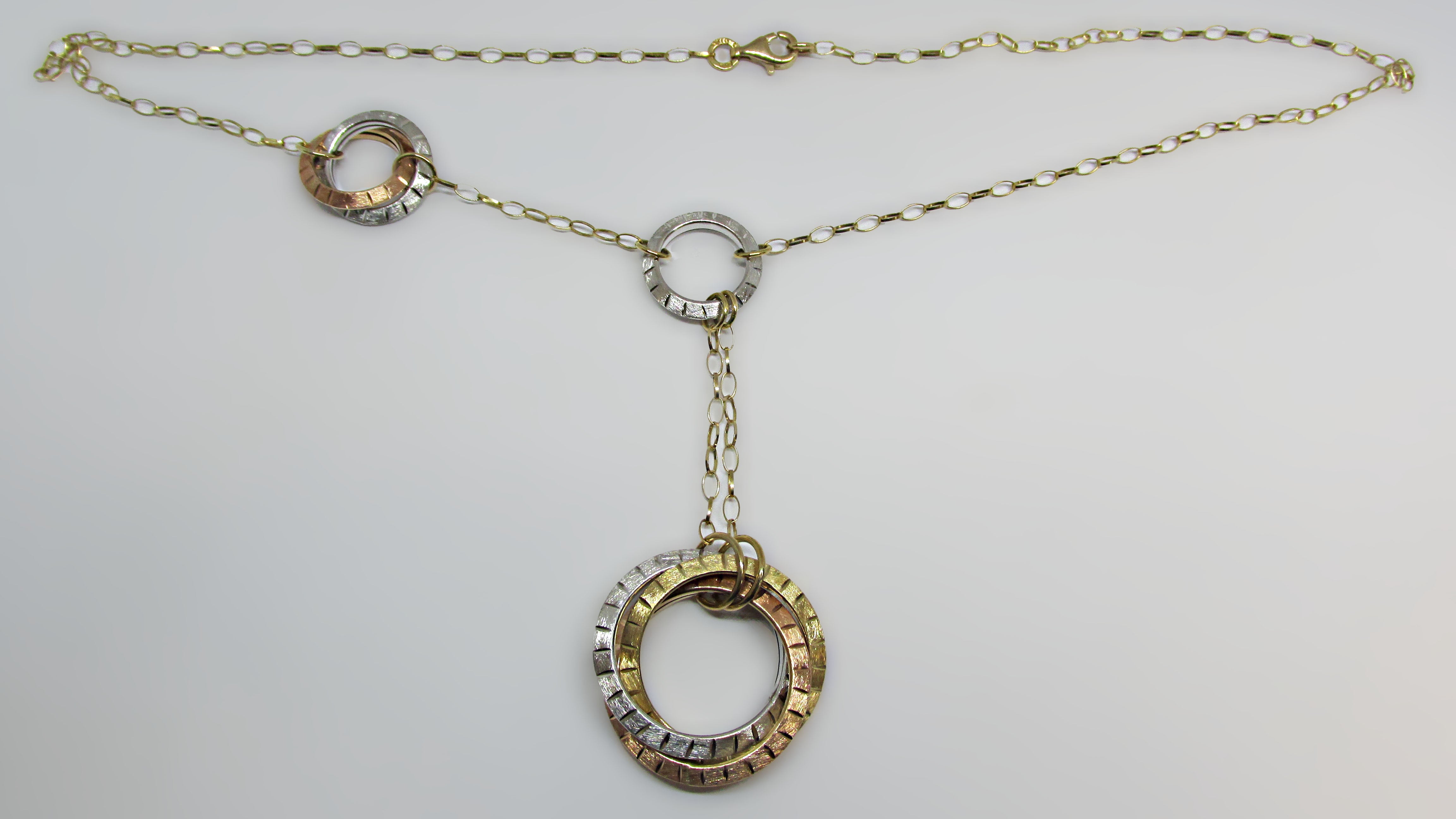 14K Multi Color Gold Interlocking Rings Necklace - Thenetjeweler