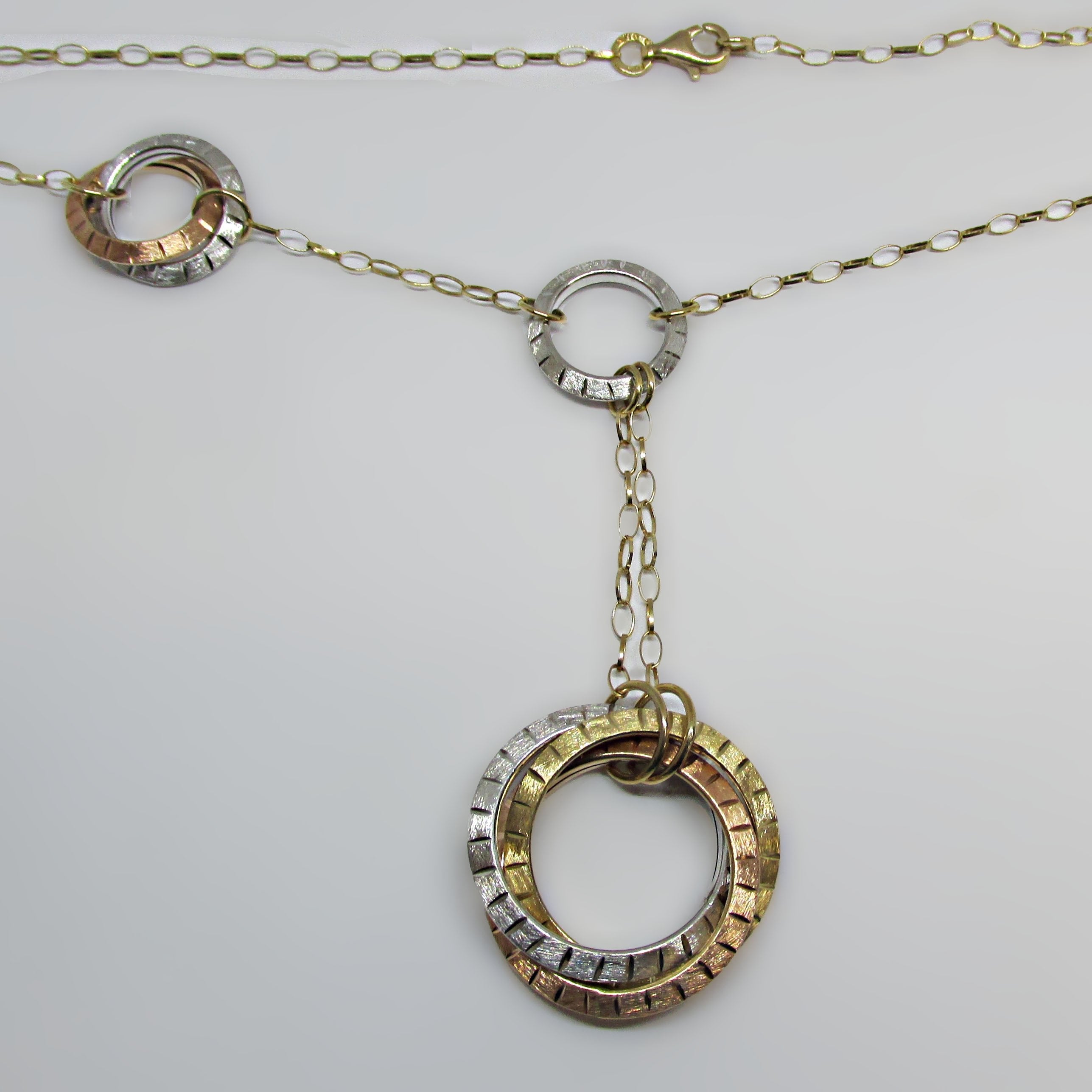 14K Multi Color Gold Interlocking Rings Necklace - Thenetjeweler