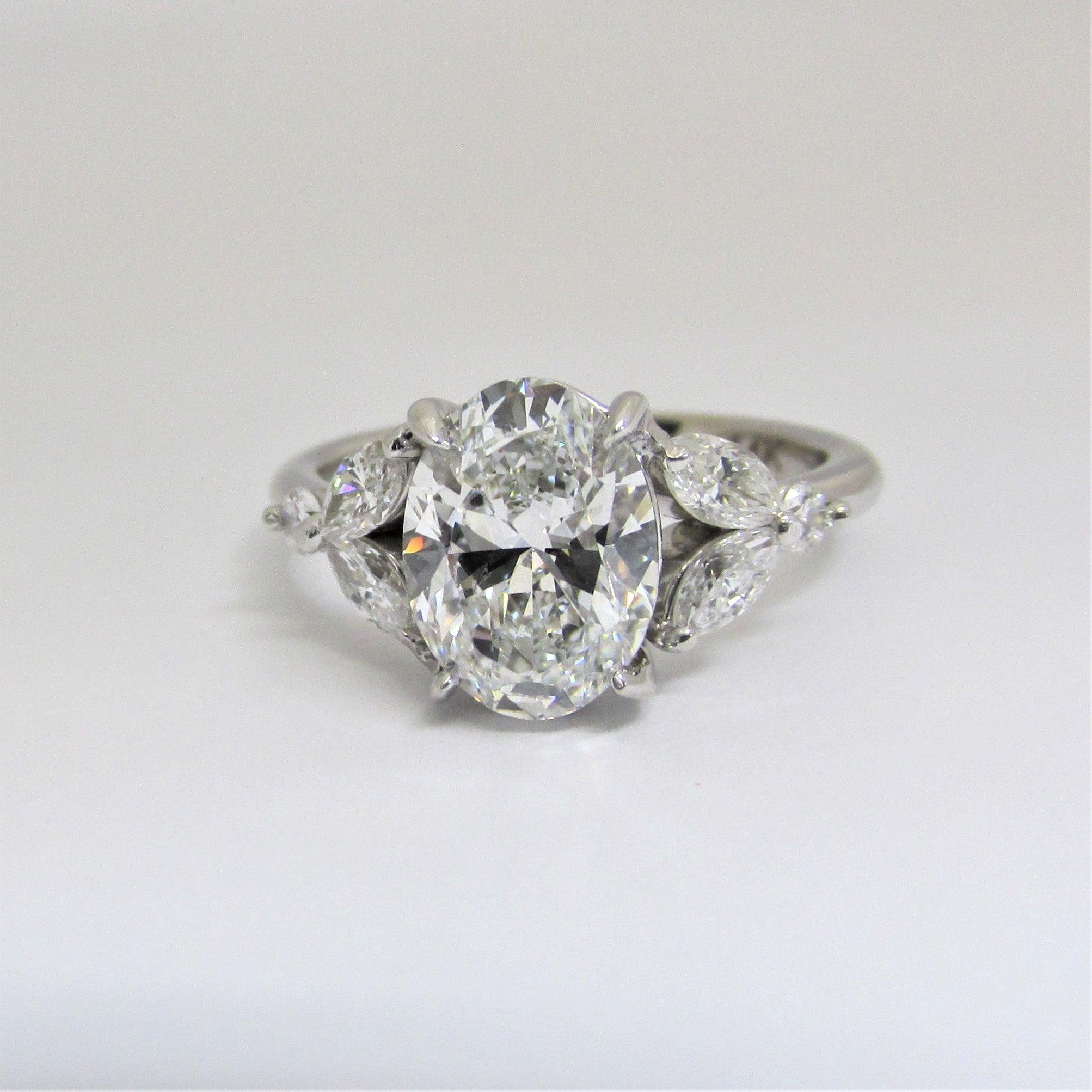 Oval Diamond and Marquise petals Engagement Ring - Thenetjeweler