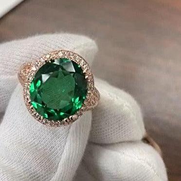 Emerald ring with diamond halo - Thenetjeweler