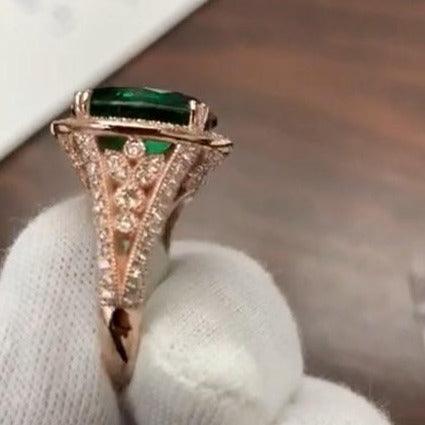 Emerald ring with diamond halo - Thenetjeweler