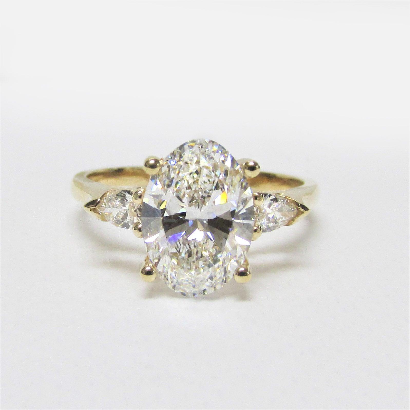 2 carat Oval Diamond Three Stone Pear Shaped Engagement Ring - Thenetjeweler