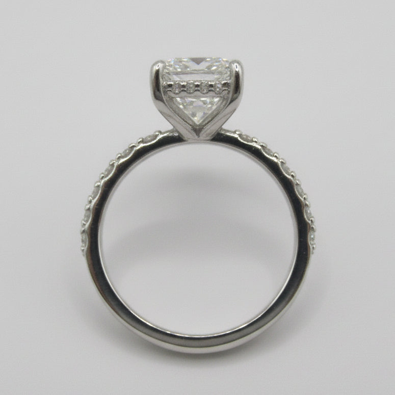 Close-up of 3.06ct emerald cut diamond with step-cut facets