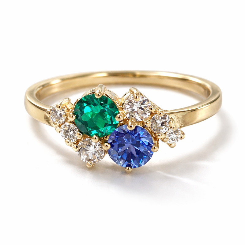 Lab-grown emerald and sapphire toi et moi ring in 14K yellow gold with diamond accents