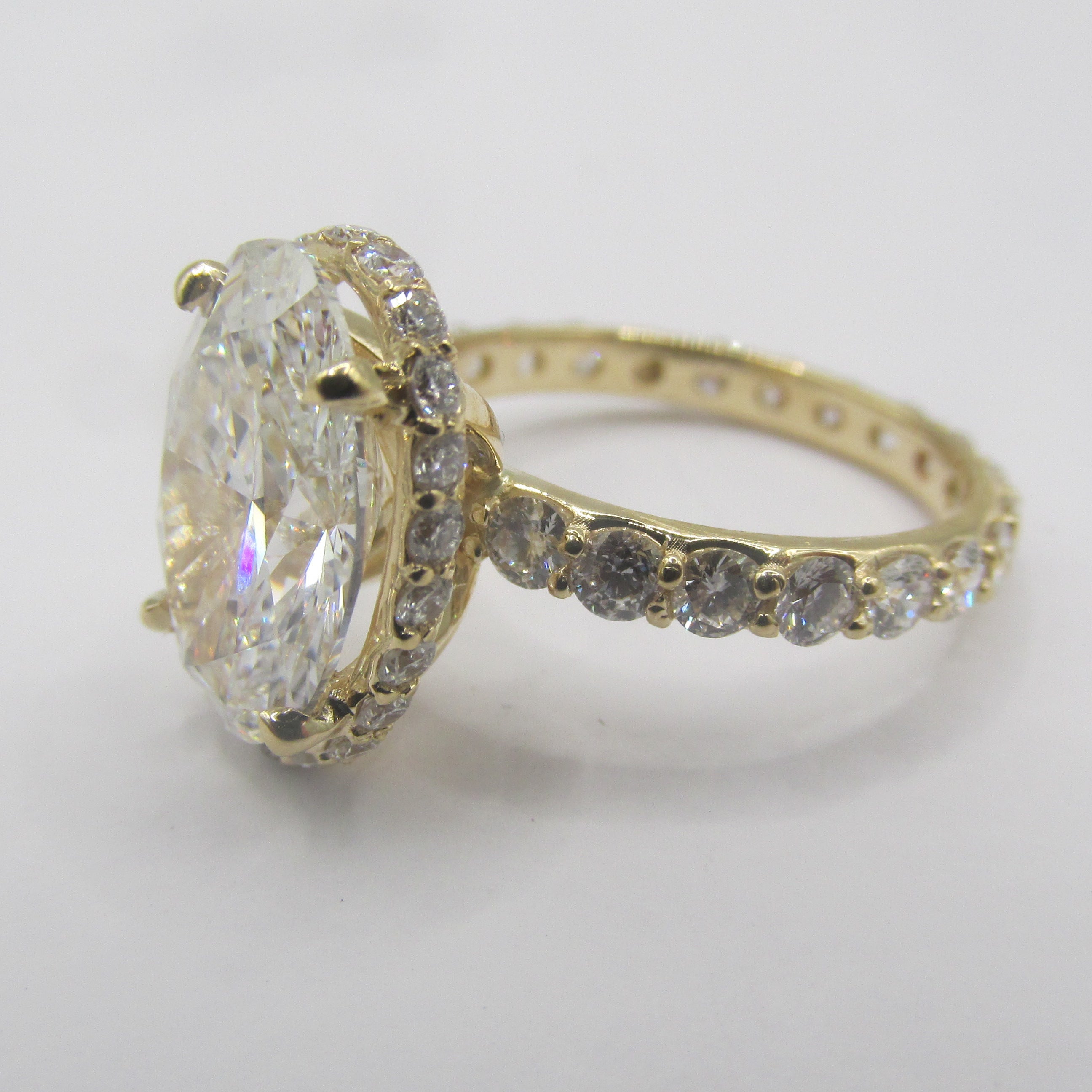 Side view of custom 14K Yellow Gold setting for Oval Lab Diamond ring