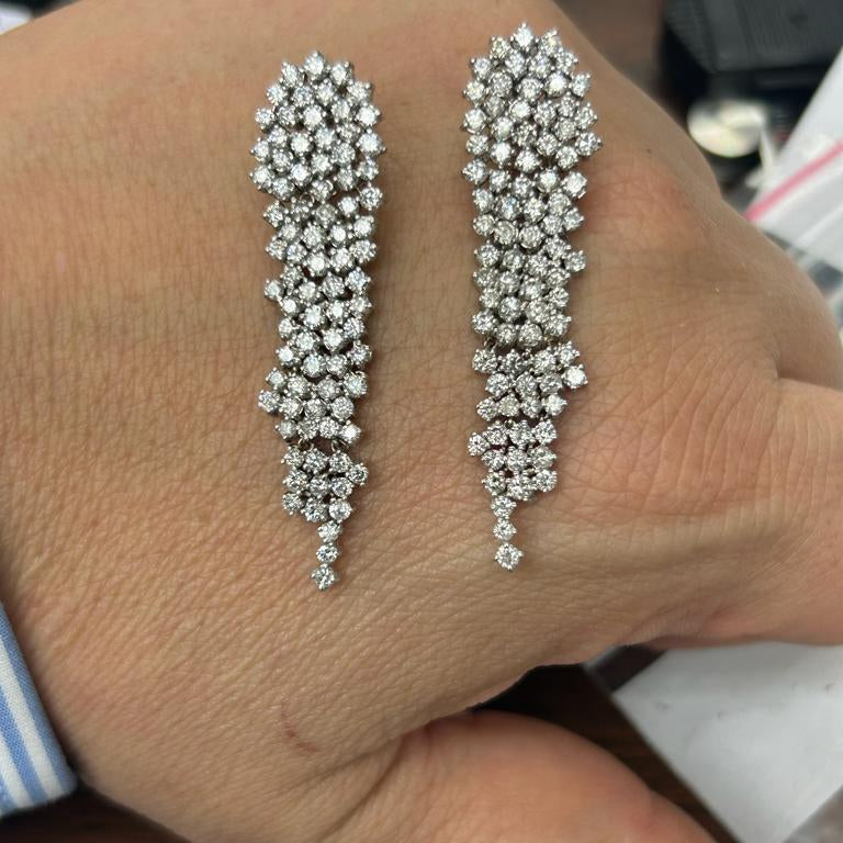 3.28 CTW Lab-Grown Diamond Cascading Drop Earrings in 14K White Gold in hands