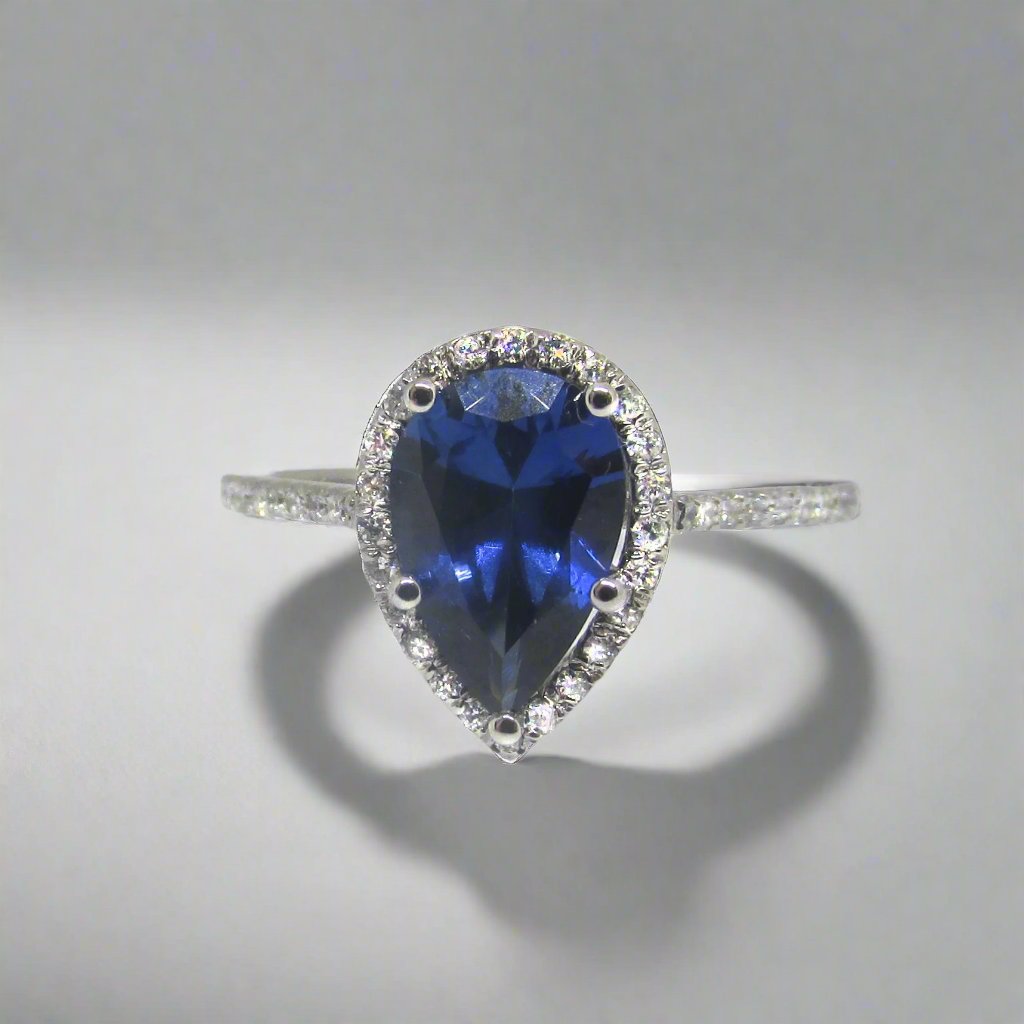 Pear Blue Sapphire Halo Engagement Ring (8x5.5mm) - Thenetjeweler