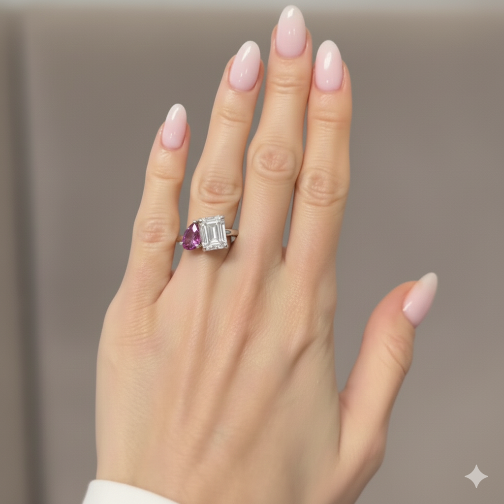 Toi et Moi Ring: Emerald Cut Diamond and Pink Sapphire Pear-Thenetjewele