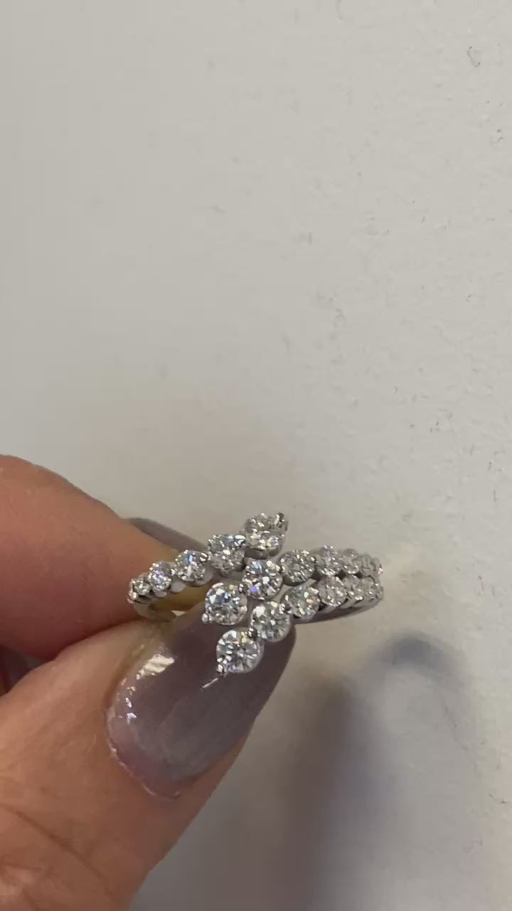 video of graduated round brilliant diamonds in white gold setting
