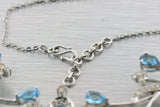 WHITE GOLD BLUE TOPAZ CHAMPAGNE DIAMOND NECKLACE - Thenetjeweler