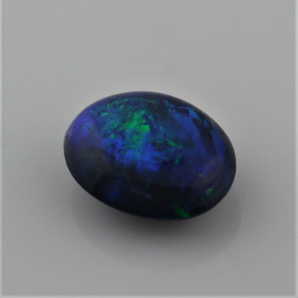 5.49 carat Bright Black Opal Oval Cabochon - Thenetjeweler