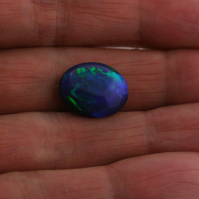 5.49 carat Bright Black Opal Oval Cabochon - Thenetjeweler