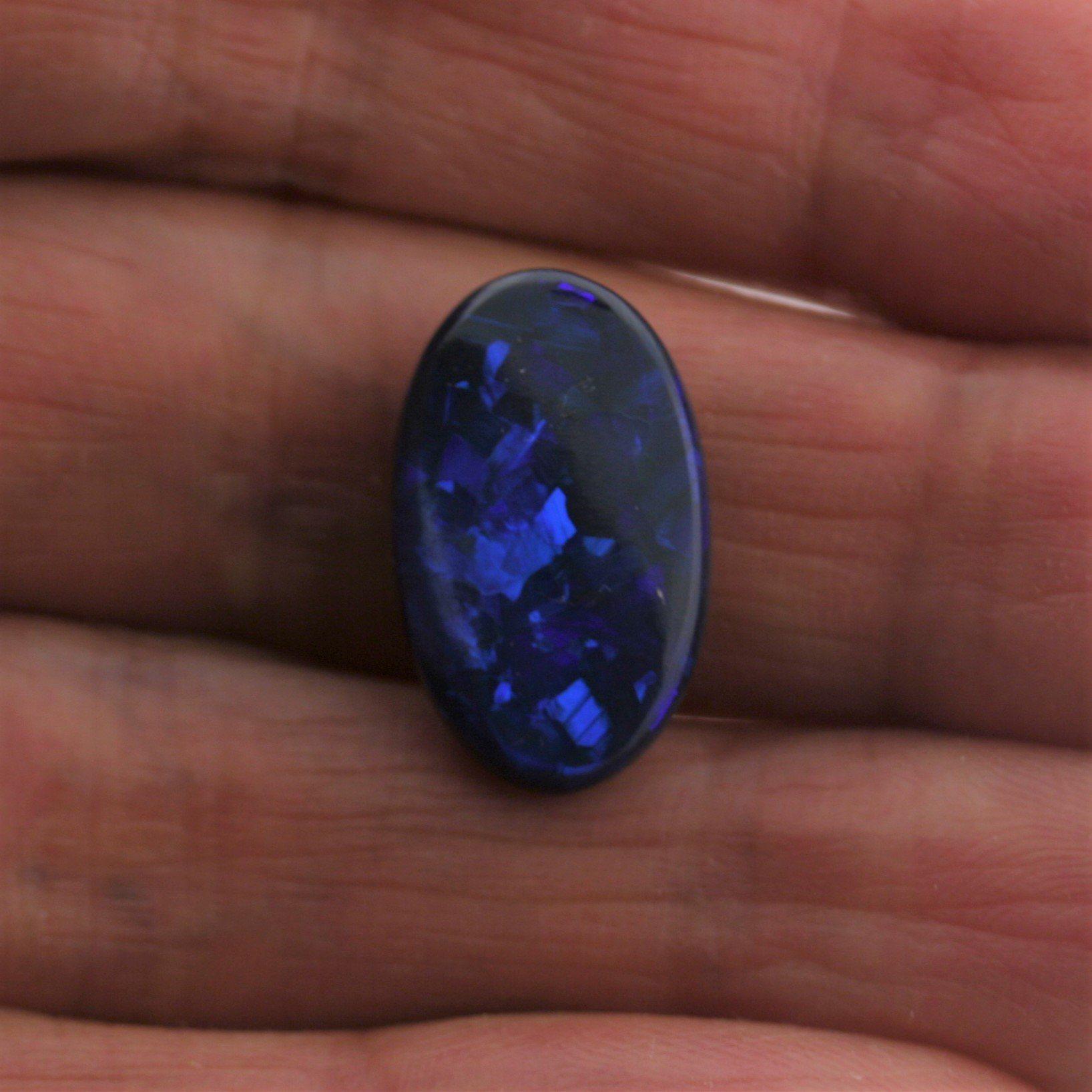 5.44 carat Black Opal Oval Flat Cabochon Blue Play of color - Thenetjeweler