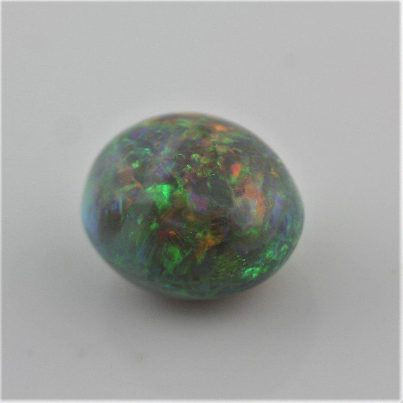 5.38 carat Australian Dark Opal Cabochon Play of color Orange Green Blue - Thenetjeweler