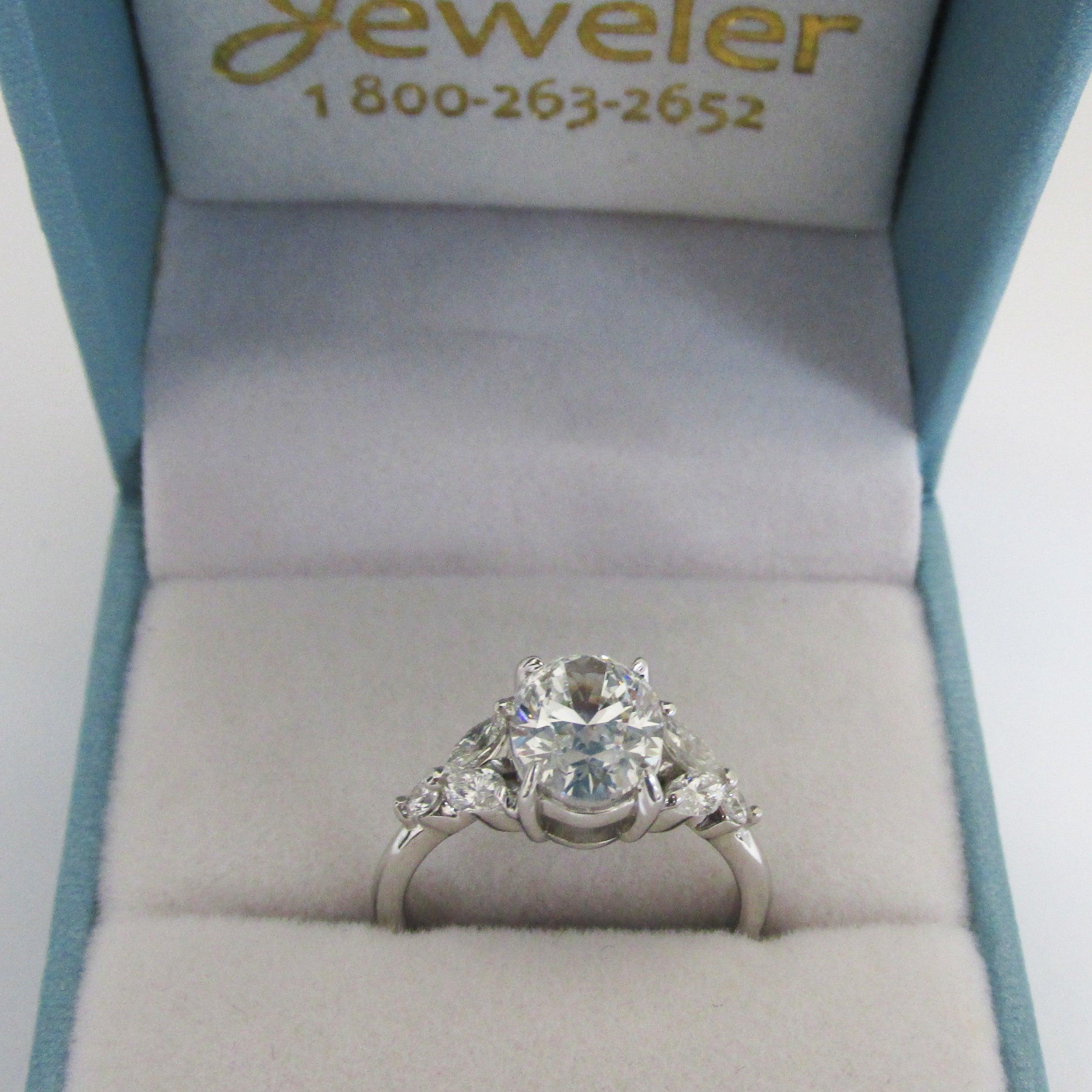 Oval Diamond and Marquise petals Engagement Ring - Thenetjeweler