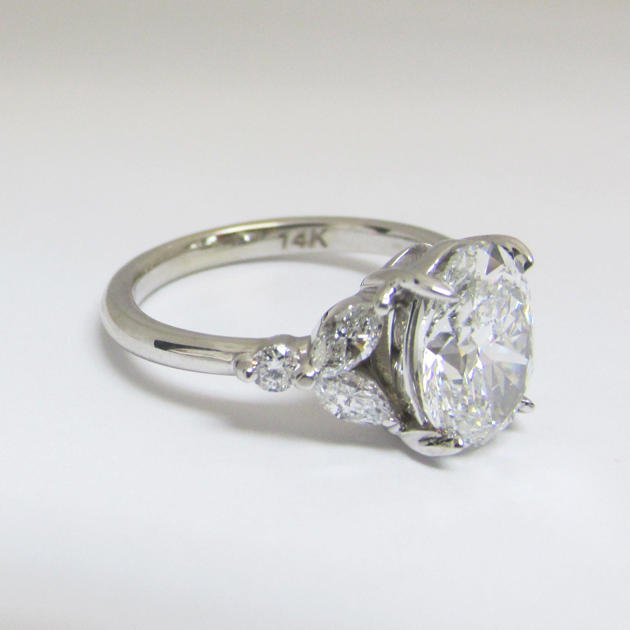 Oval Diamond and Marquise petals Engagement Ring - Thenetjeweler