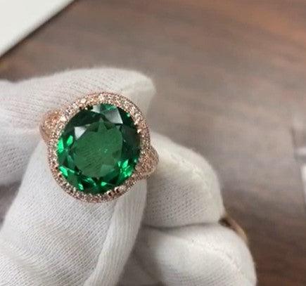 Emerald ring with diamond halo - Thenetjeweler